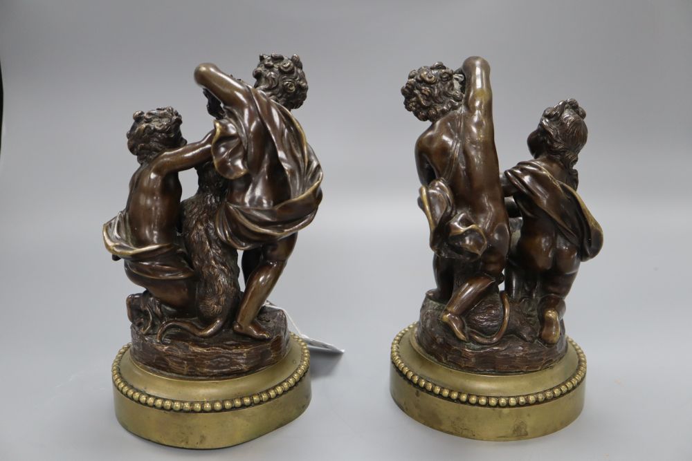 A pair of neo-classical style bronzes of children and a monkey, height 22cm